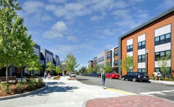 Flat 9 at Whittier breaks down isolating superblock layouts by incorporating bisecting streets through the developments that connect them to their greater communities