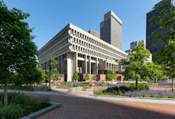 exterior photo of boston city hall plaza landscape with building in background, people walking through the space