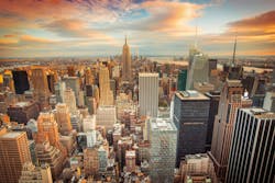 Sunset aerial view of New York City looking over midtown Manhattan towards downtown. Sunset aerial view of New York City looking over midtown Manhattan towards downtown.