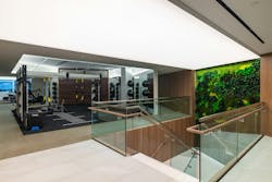 101 Constitution Ave., Washington, D.C. The renovation tripled the size of the fitness center. The communicating staircase was cut in from the ground floor down to the lower level, adding locker space, changing rooms, saunas, and private training space.