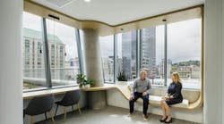 Davis Wright Tremaine, Portland, Ore. Continuous curved wood casework creates both seating and workstations. Davis Wright Tremaine, Portland, Ore. Continuous curved wood casework creates both seating and workstations.