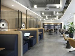 Hub International, Toronto, Ontario, Canada. The work caf&eacute; extends around the corner, where cozy booths and lounge seating provide a different setting for work and social interactions at HUB