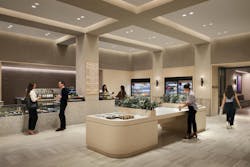 Office café and kitchen area with people talking Office café and kitchen area with people talking