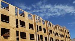 Large Apartment Complex under Construction. New construction of a large apartment complex Large Apartment Complex under Construction. New construction of a large apartment complex