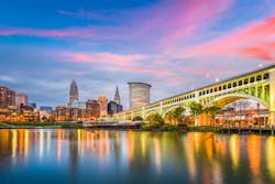 Cleveland, Ohio, USA downtown city skyline on the Cuyahoga River at twilight.