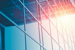 Business Office Glass Windows Building with Sun Reflect for Modern Construction Background