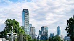 City skyline with modern skyscrapers glass building and greenery. Sustainable urban development. Urban landscape. Balance between city infrastructure, environmental planning, and clean city living