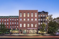 The Irish Arts Center in New York, N.Y., blends historic and modern design, creating a vibrant hub for performance, education, and cultural engagement. Photo &copy; Albert Vecerka/Esto