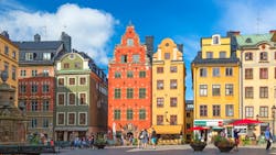 Stockholm, Sweden - July, 2018: Colorful facade of the houses in Stortorget Square Gamla Stan. Stockholm, Sweden with tourists at summer sunny day Stockholm, Sweden - July, 2018: Colorful facade of the houses in Stortorget Square Gamla Stan. Stockholm, Sweden with tourists at summer sunny day
