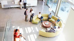 Reception Area Of Modern Office Building With People Overhead Shot Reception Area Of Modern Office Building With People Overhead Shot