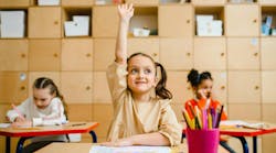 Girl Raising Hand Inside the Classroom